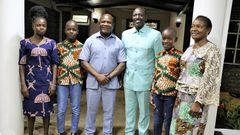 Kakamega Governor Fernandes Barasa and his family pose for a photo with President William Ruto
