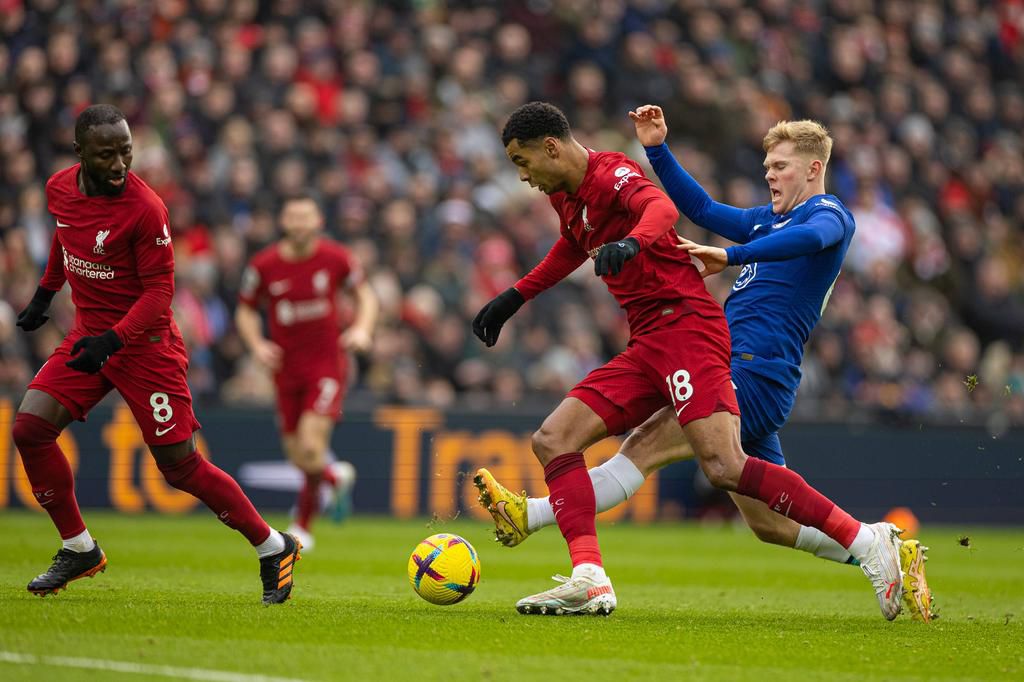 Liverpool's Cody Gakpo contests against Chelsea's Lewis Hall