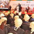 A group of lawyers during admission to the bar