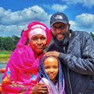 Shaffie Weru with his mother and daughter