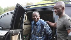 File image of former Prime Minister Raila Odinga and his bodyguard, Maurice Ogeta