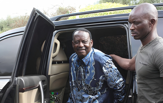 File image of former Prime Minister Raila Odinga and his bodyguard, Maurice Ogeta