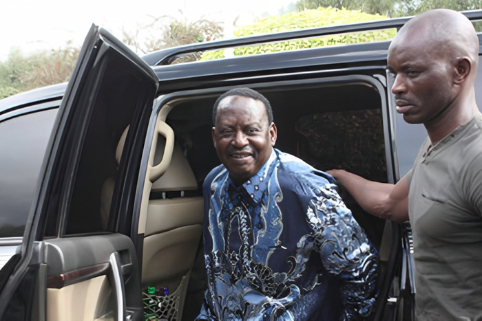 File image of former Prime Minister Raila Odinga and his bodyguard, Maurice Ogeta