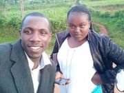Kisii singer Chris Embarambamba poses for a photo with his wife