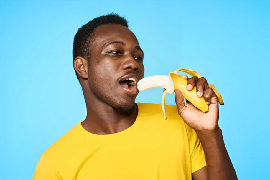 Man eating a banana