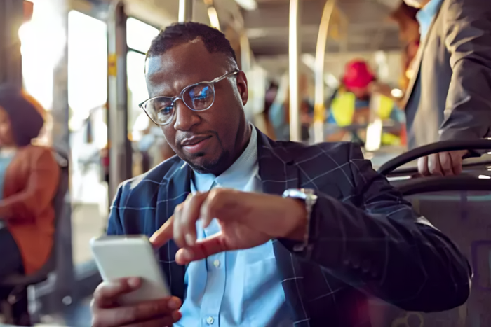 A man using a phone in public