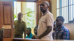 Pastor Paul Mackenzie Nthenge  accompanied by some of his followers during a court appearance in Malindi on April 17, 2023 [Photo: AP]