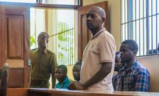 Pastor Paul Mackenzie Nthenge  accompanied by some of his followers during a court appearance in Malindi on April 17, 2023 [Photo: AP]