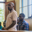 Pastor Paul Mackenzie Nthenge  accompanied by some of his followers during a court appearance in Malindi on April 17, 2023 [Photo: AP]
