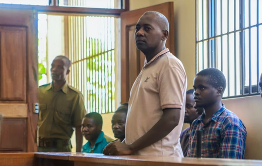 Pastor Paul Mackenzie Nthenge  accompanied by some of his followers during a court appearance in Malindi on April 17, 2023 [Photo: AP]