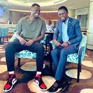 Harambee Stars captain, Michael Olunga (left) and Ababu Namwamba (right) in Qatar.