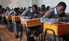 Students writing their KCSE