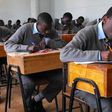 Students writing their KCSE