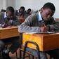 Students writing their KCSE