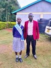Ben Bii Kaproron and his daughter