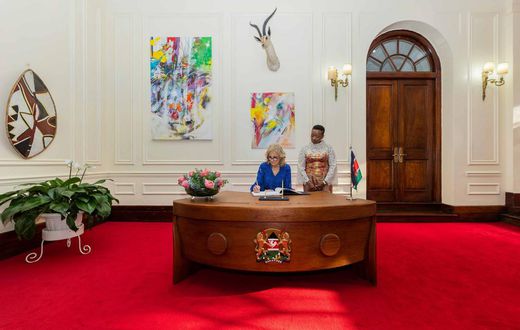 US First Lady Jill Biden signs the visitors book at State House, Nairobi on February 24, 2023