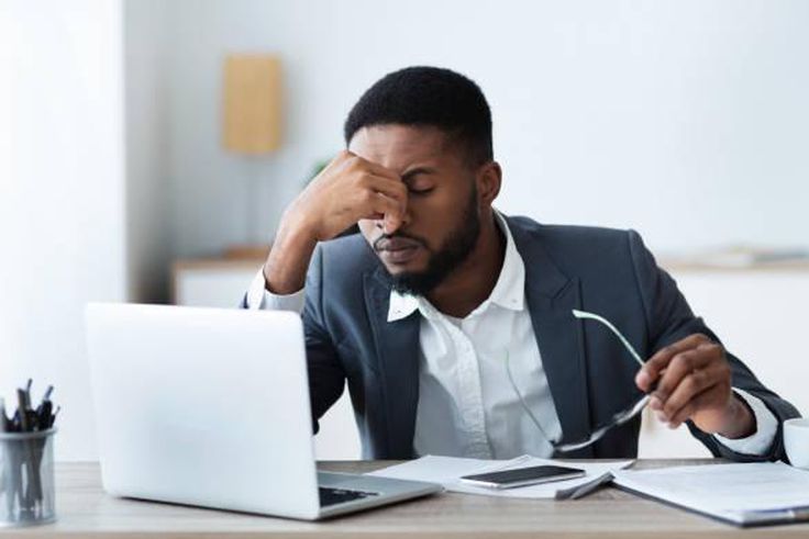 Tired man in an office