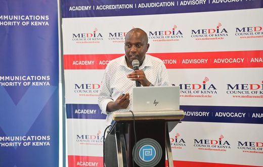 Media Council CEO David Omwoyo speaking during the launch of the State of the Media Report 2022