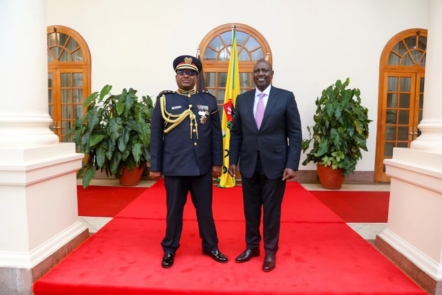 Outgoing Inpsector General of Police Japheth Koome and President William Ruto (1)