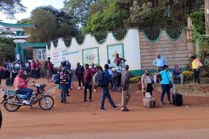 Examiners leave St Francis Girls Mangu High School after the examination centre was closed following a strike