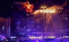 A giant blaze is seen over Crocus City Hall in Moscow after several gunmen burst into a concert hall and fired at the crowd on Friday, March 22, 2024 [Courtesy]