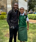 DJ Moh Spice and his daughter during admission to Alliance High School