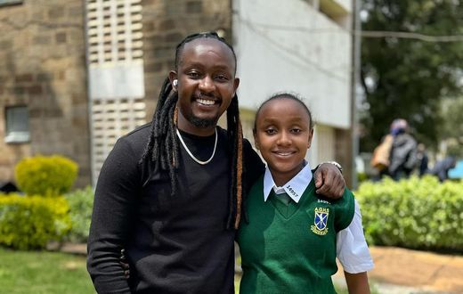 DJ Moh Spice and his daughter during admission to Alliance High School