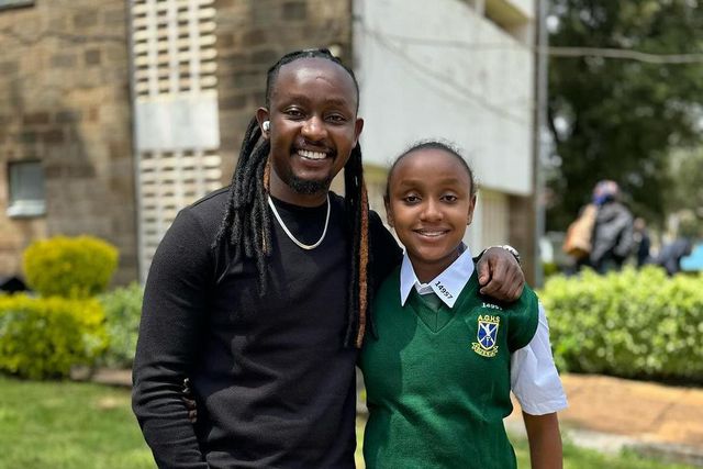 DJ Moh Spice and his daughter during admission to Alliance High School