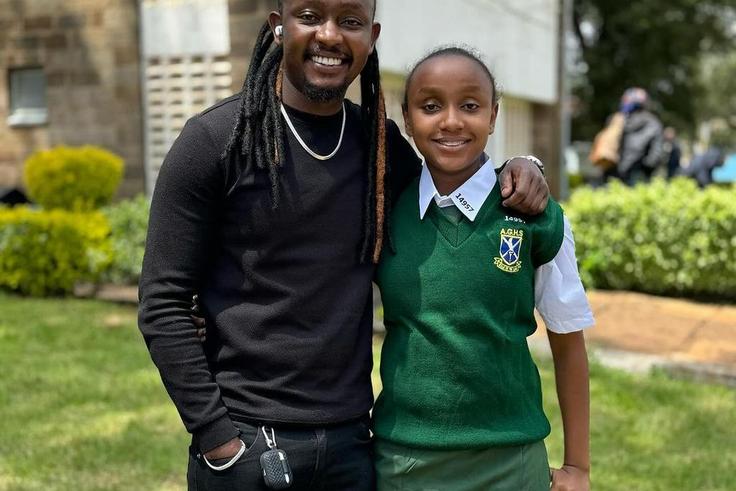 DJ Moh Spice and his daughter during admission to Alliance High School