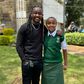 DJ Moh Spice and his daughter during admission to Alliance High School