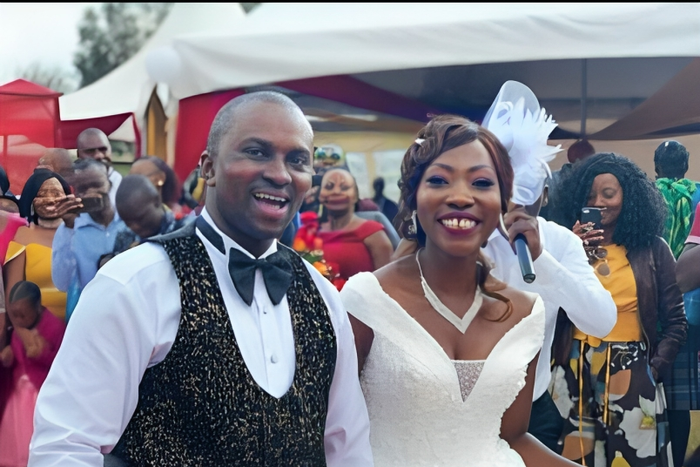 Citizen TV's Wycliffe Orandi and his wife Sheila Achieng during their wedding in 2019