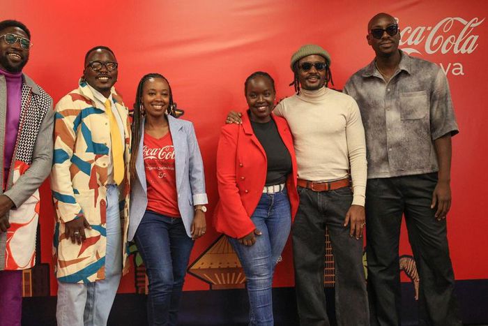 Polycarp, Chimano, Savara and Bien from Sauti Sol pose for a photo with Isabelle Rostom Kariuki, Coca Cola's Marketing Director, East and Central Africa at the Sol Fest partnership announcement between Coke Studio and Sauti Sol, earlier today at the Co...