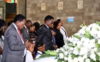 Sports CS Ababu Namwamba and his family at Consolata Shrine during the requiem mass of Prisca Mwaro