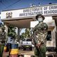 Police officers monitor the entrance to the DCI headquarters.  (Image- The Washington Post)