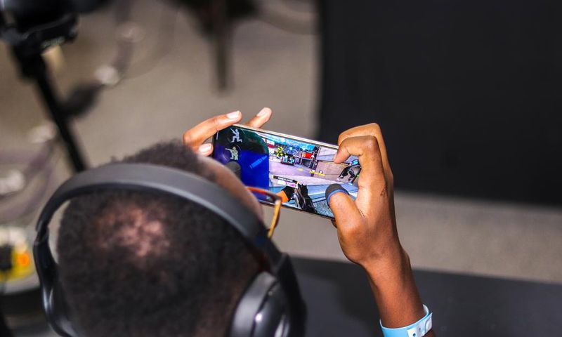 A gaming enthusiast enjoying a game