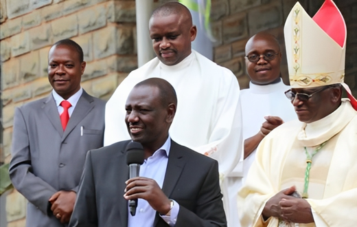 President William Ruto presenting a donation to Embu Catholic Bishop Paul Kariuki during a past service