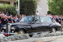 Bride Rajwa Al Saif arrives in a vintage 1968 Rolls Royce Phantom V