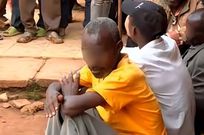 A crowd at the scene where several people died and others went blind after consuming illicit brew in Kirinyaga