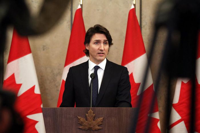 Canada's Prime Minister Justin Trudeau speaks with reporters during a news conference on Parliament Hill February 11, 2022 in Ottawa, Canada.