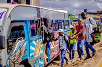Passengers boarding a matatu