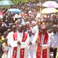 Nyeri Catholic Archbishop Antony Muheria carries a cross as led other faithful in a religious procession to Our Lady of Constanta Cathedral in Nyeri during a past event