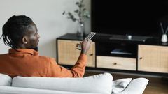 A man watching TV