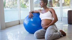 A pregnant woman working out