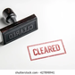 Rubber stamping that says cleared
