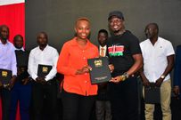Sports and Youth Affairs Cabinet Secretary, Ababu Namwamba with Carol Radull at Kasarani Stadium on February 15, 2023