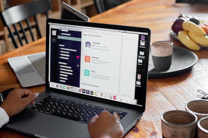 Person using laptop on table [Image: Mikhail Nilov]