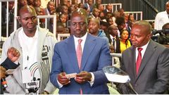 President William Ruto, Interior CS Kithure Kindiki & Immigration & Citizen Services PS Juilus Bitok during the launch of 5,000 digitized government services at KICC on June 30, 2023