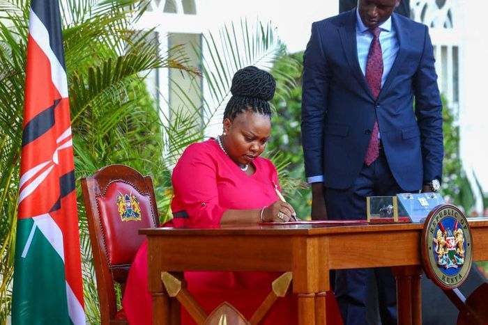 Interior CAS Millicent Omanga signs her oath of office at State House on March 23, 2023