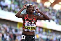 EUGENE, OREGON - JULY 18: Faith Kipyegon of Team Kenya reacts after competing in the Women's 1500m Final on day four of the World Athletics Championships Oregon22 at Hayward Field on July 18, 2022 in Eugene, Oregon. (Photo by Hannah Peters/Getty Images for World Athletics)