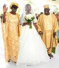 Singer Akothee, her mother and father on her wedding day
